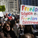 Demonstrators gather in Indianapolis to protest new religious freedom law