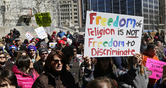 Demonstrators gather in Indianapolis to protest new religious freedom law